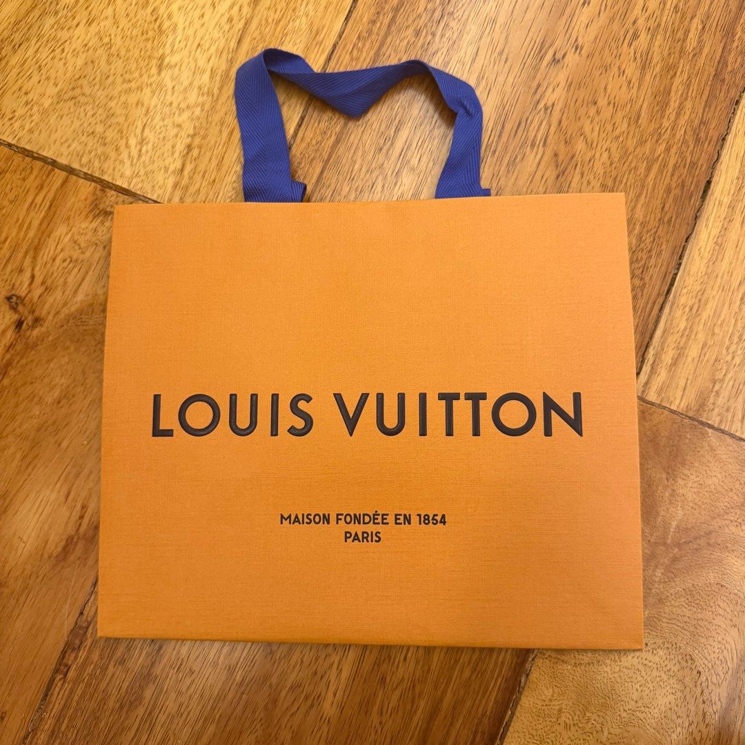 Authentic Louis Vuitton Paper Bag (Category: Luxury Bags & Wallets) located in Las Pinas. Submitted by bubustings_ (Listing ID 1411193097, Image 1). Description: - Authentic small size Louis Vuitton shopping bags - 25cm x 21cm - have other LV paperbag sizes on my page - Perfect for gifting or collecting! .