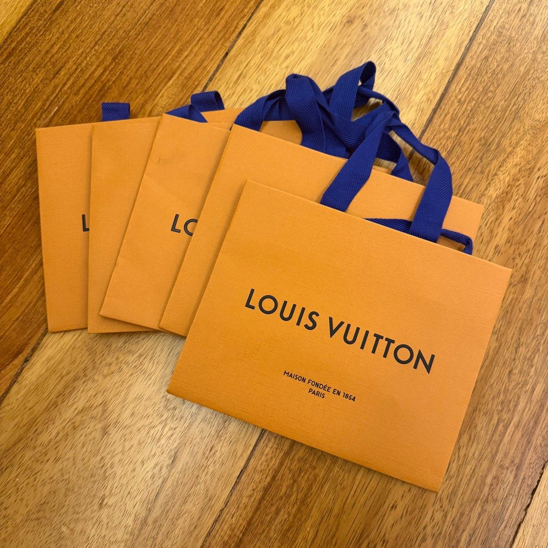 Authentic Louis Vuitton Paper Bags (Category: Luxury Bags & Wallets) located in Las Pinas. Submitted by bubustings_ (Listing ID 1411185019, Image 1). Description: - Authentic small size Louis Vuitton shopping bags - 22cm x 18 cm - have other LV paperbag sizes on my page - 5 in stock - Perfect for gifting or collecting! .