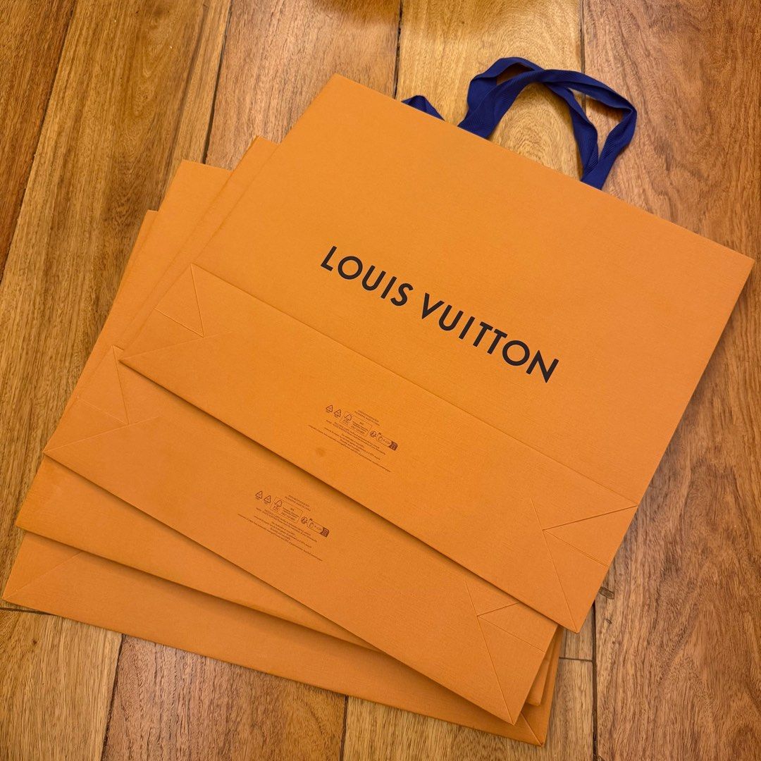 Authentic Louis Vuitton Shopping Bags (Category: Luxury Bags & Wallets) located in Las Pinas. Submitted by bubustings_ (Listing ID 1411184164, Image 1). Description: - Authentic large Louis Vuitton shopping bags - 48cm x 39cm - have other LV paperbag sizes on my page - 4 in stock - Perfect for gifting or collecting! .