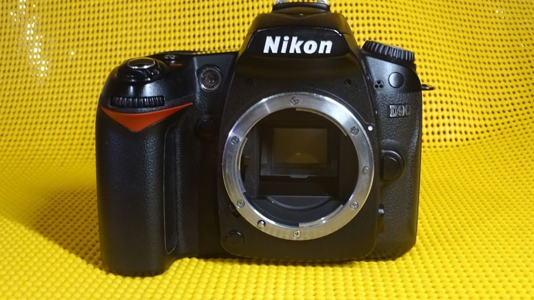 nikon D90 DSLR camera body only (Category: Cameras) located in Paranaque City. Submitted by kutoi.ancheta (Listing ID 1411230082, Image 1). Description: Digital Single-Lens Reflex (DSLR) Camera Body TITLE: Nikon D90 PRODUCTION YEAR: 2008 (Launch year; this unit produced between 2008–2011) RELEASE DATE: August 27, 2008 MANUFACTURER: Nikon Corporation (Manufactured in Thailand, Serial #2277177) PHYSICAL DESCRIPTION: Black polycarbonate alloy chassi