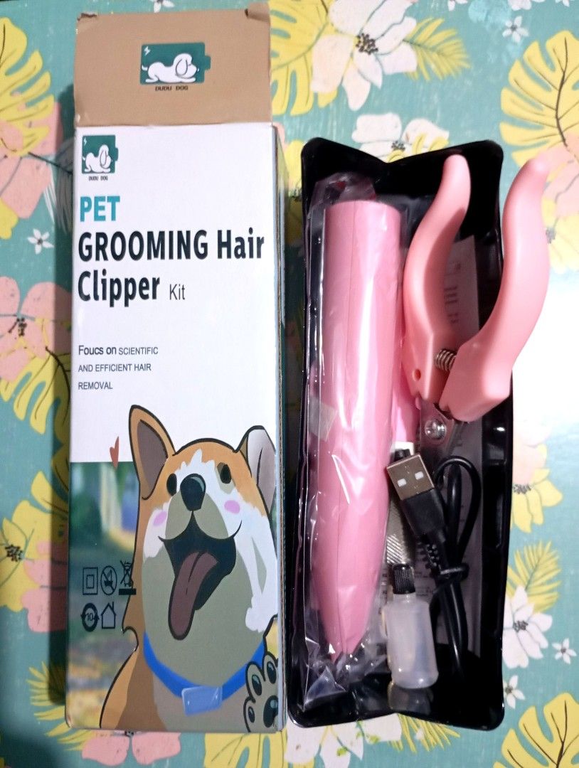 Pet Grooming Hair Clipper Kit (Category: Health & Grooming) located in Quezon City. Submitted by an.marie (Listing ID 1411263500, Image 1). Description: - Pet grooming kit for your furry friend. - Includes a pink hair clipper with USB charging cable. - Also includes nail clippers. - Designed for efficient hair removal. - Ideal for at-home grooming..