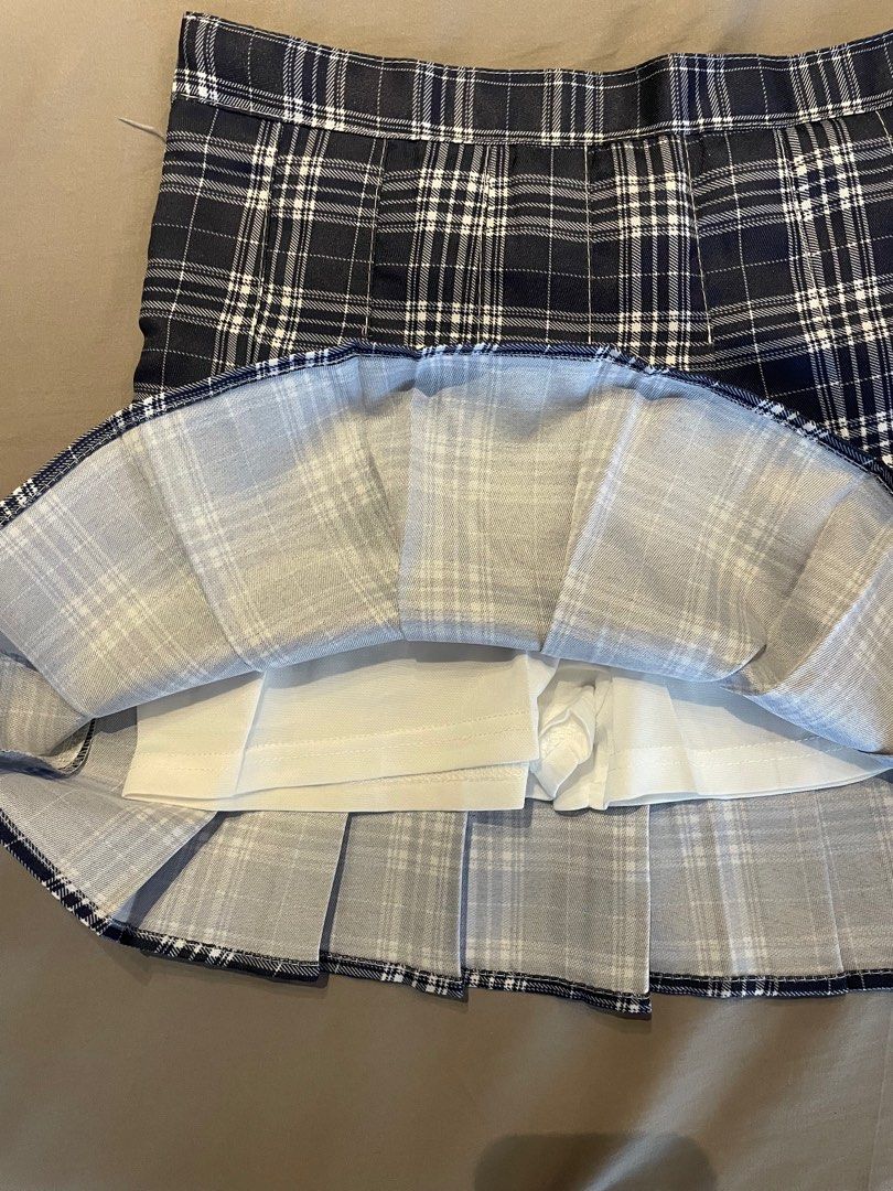 Plaid Pleated Mini Skirt (Category: Skirts) located in Silang. Submitted by b4wang (Listing ID 1411187786, Image 2). Description: - plaid mini skirt with shorts inside - big thigh friendly - high waist - worn once - zipper to close sa side .
