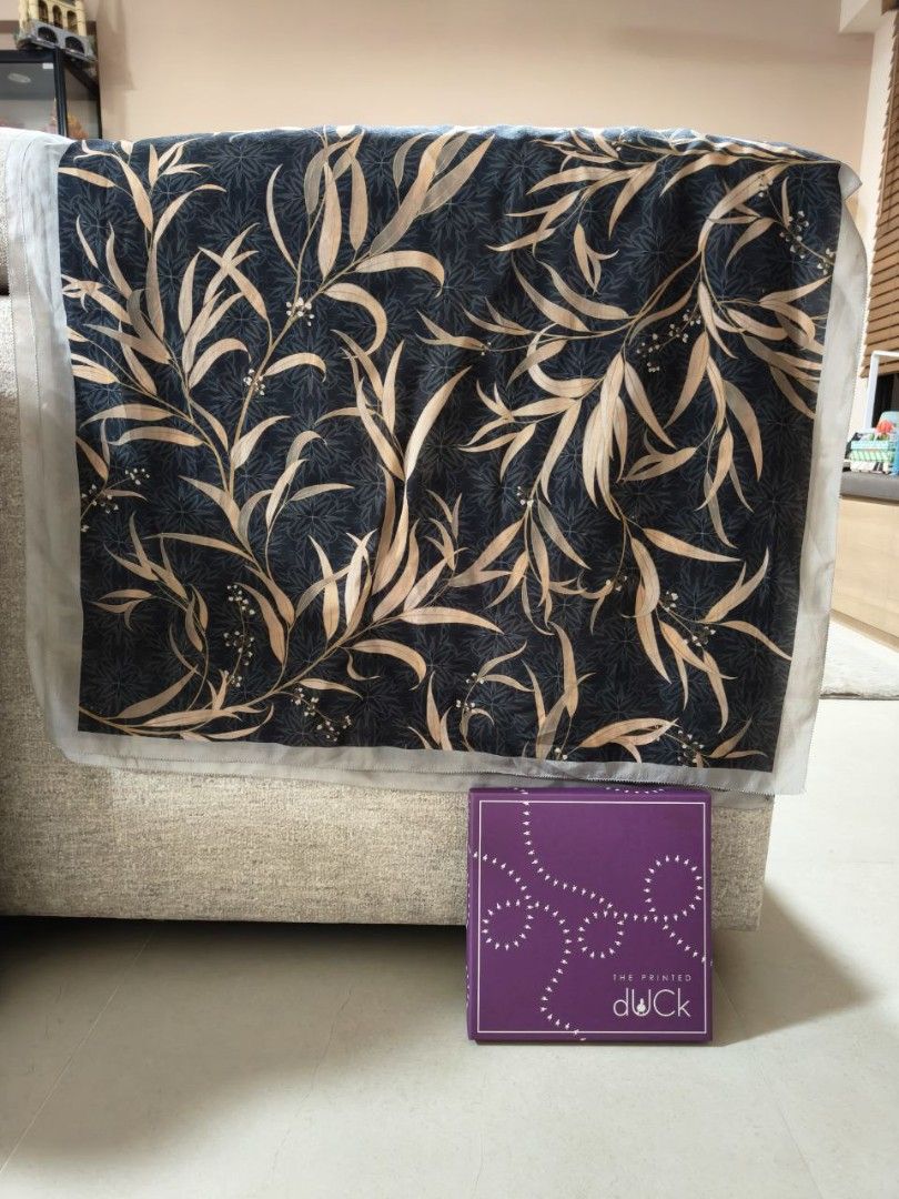 Preloved dUCk Shawl [Tencel Collection] (Category: Hijabs) located in Singapore. Submitted by cicimoush (Listing ID 1411211458, Image 1). Description: - Tencel dUCk scarf in Black - Features a black base with beige/yellow willow leaves - Comes with original box - Perfect for collectors or as a unique fashion accessory - Material: Plant-based tencel, breathable fabric .