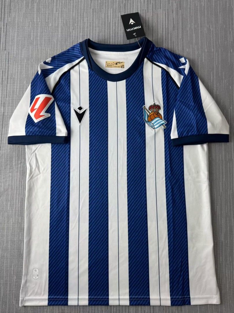 Real Sociedad Home Jersey 26/27 (Category: Activewear) located in Singapore. Submitted by calcio_sport_jersey (Listing ID 1411160137, Image 1). Description: 🎽PRE-ORDER: Customize Sports Jerseys✨ ✅ Easy Payment: Paynow ✅ Latest or Retro Style ✅ Pm Me For More Jersey Info ✅ Personalize: Name, Number, Patch ✅ Affordable Printing: $5 (Name + Number) ✅ Patch Add-ons: $2 each 🎉Free Shipping on 2+ items‼️🎉 Buy more and save on delivery/discount！ ⚠️ D