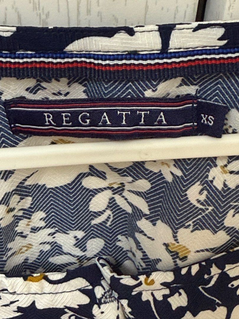 Regatta Floral Blouse XS (Category: Blouses) located in Quezon City. Submitted by _cmls (Listing ID 1411219032, Image 3). Description: - Regatta floral blouse - Navy and white print - Size: XS - Peplum design - Short sleeves - Button-down front - Round neckline - Great for a casual and stylish look.