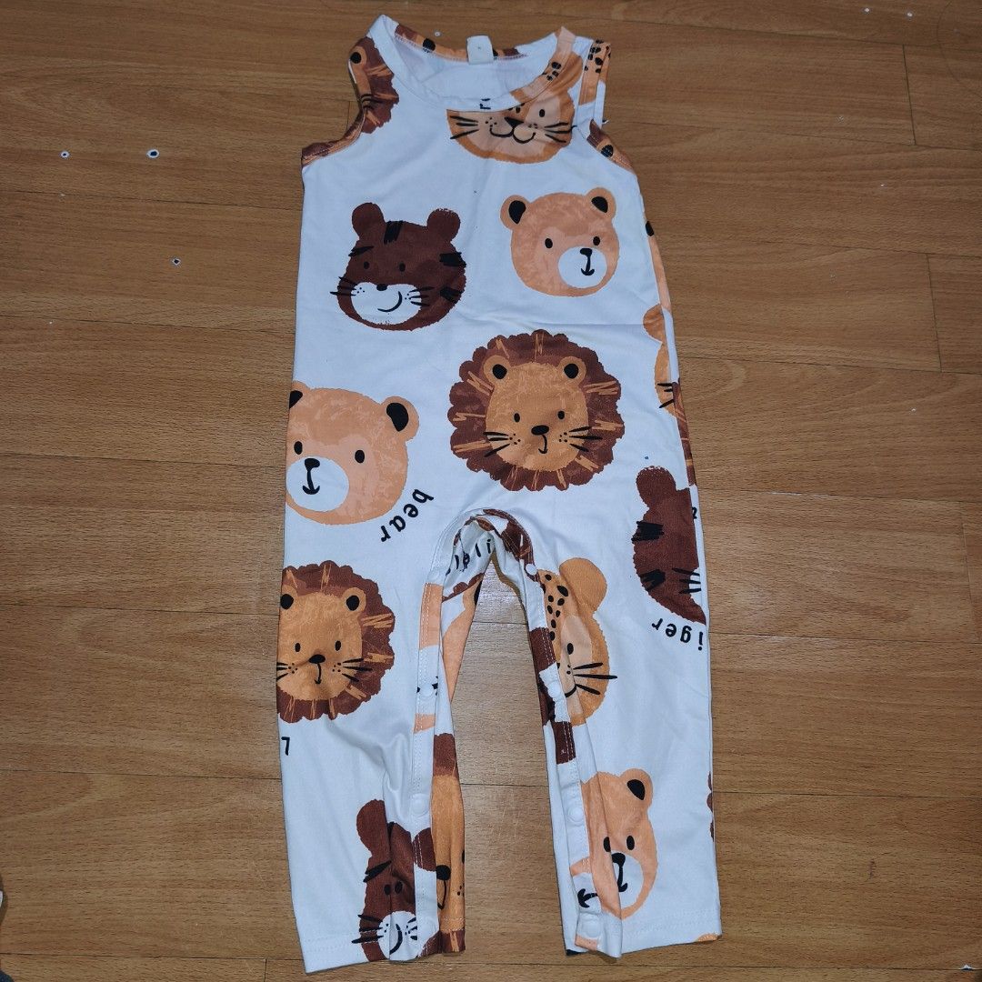 Shein Animal Print Sleeveless Romper (Category: Babies & Kids Fashion) located in Bulacan. Submitted by arden0615 (Listing ID 1411188930, Image 2). Description: - Shein baby romper, size 12-18 months. - Features a playful animal print (bears, lions, tigers). - Sleeveless design, ideal for warm weather. - Made from soft and comfortable fabric..