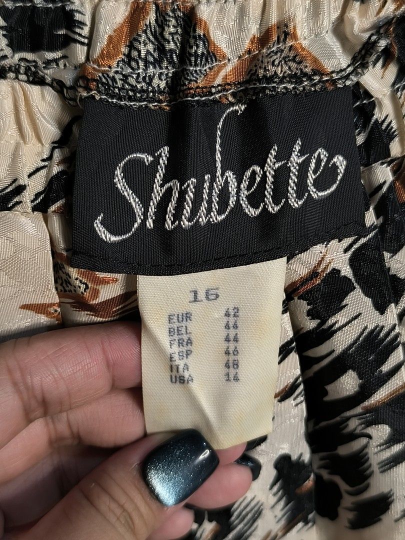 Shubette Pleated Skirt Size 16 (Category: Skirts) located in Marikina City. Submitted by vaughnify (Listing ID 1411231488, Image 2). Description: - Shubette pleated skirt - Euro 42 size - Unique pattern: black, brown, and beige - Black border at the bottom - Perfect for a stylish look 📍Marikina City.