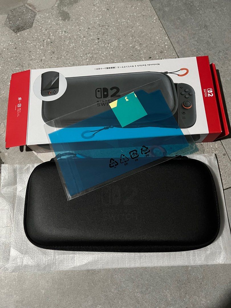 Switch 2 official casing (Category: Cases & Covers) located in Singapore. Submitted by leekc93 (Listing ID 1410143595, Image 1). Description: - Switch 2 official casing - As good as new - Casing with screen protector only - COD at Raffles Place MRT @ 6pm.