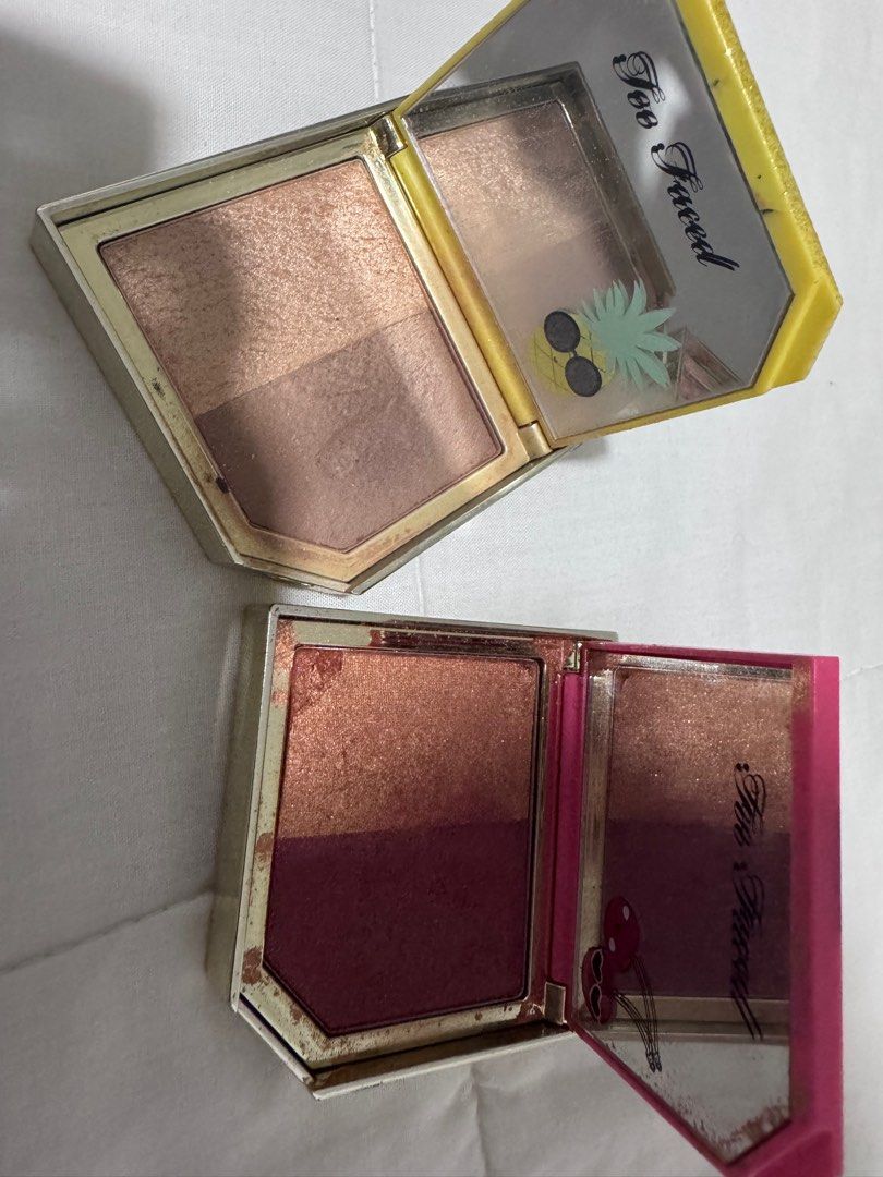 Too Faced Highlighter Palette (Category: Makeup) located in Manila. Submitted by decluterthings888 (Listing ID 1411114958, Image 1). Description: - Two Too Faced highlighter palettes - Pineapple Palette: - Gold and bronze highlighter - Blush - Cherry Palette: - Bronze highlighter - Deep red blush.