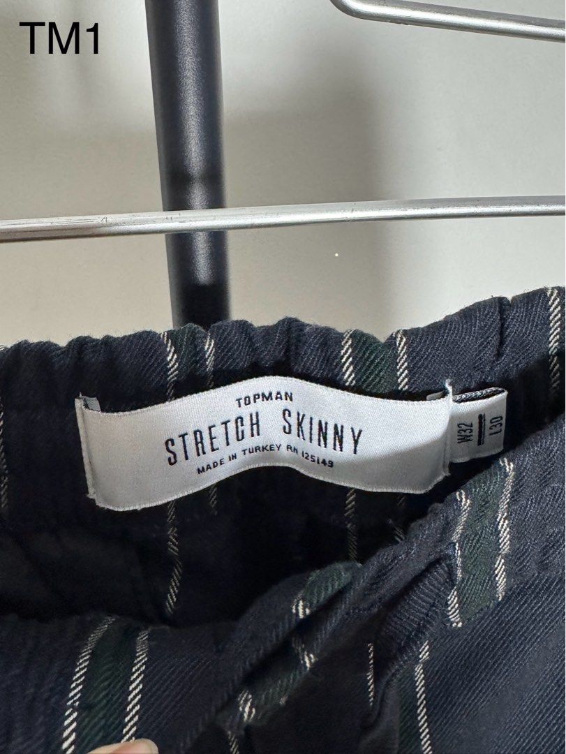Topman Pants (Category: Trousers) located in Makati City. Submitted by ysabelkgsk (Listing ID 1411197352, Image 2). Description: - Topman Stretch Skinny pants - Size: US32 - Design: Black and green stripes.