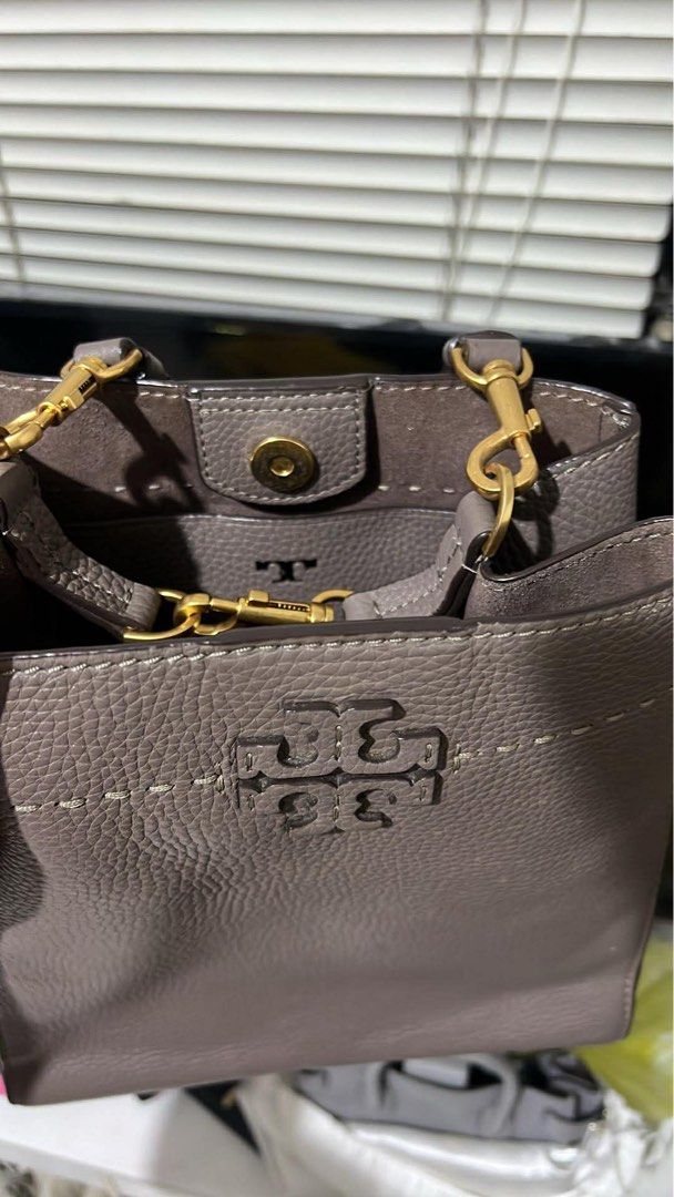 Tory Burch Mcgraw (Category: Luxury Bags & Wallets) located in Manila. Submitted by lovely.112 (Listing ID 1411199353, Image 2). Description: - Tory Burch mcgraw handbag - Pebbled leather exterior - Neutral color - Top handle and detachable strap - Gold-tone chain strap - Snap closure - Tory Burch logo detail.