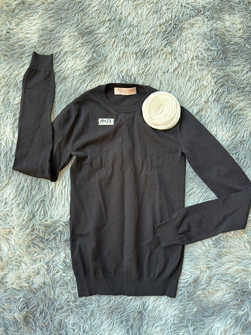 Valentino Black Sweater XS (Category: Coats, Jackets and Outerwear) located in Legazpi City. Submitted by tiny0509 (Listing ID 1411168718, Image 1). Description: - Valentino black sweater - Size: XS - Features: Crew neck, long sleeves - Made in Italy - Design: Simple, classic - Material: Fine knit - Care label visible - Suitable for various occasions.