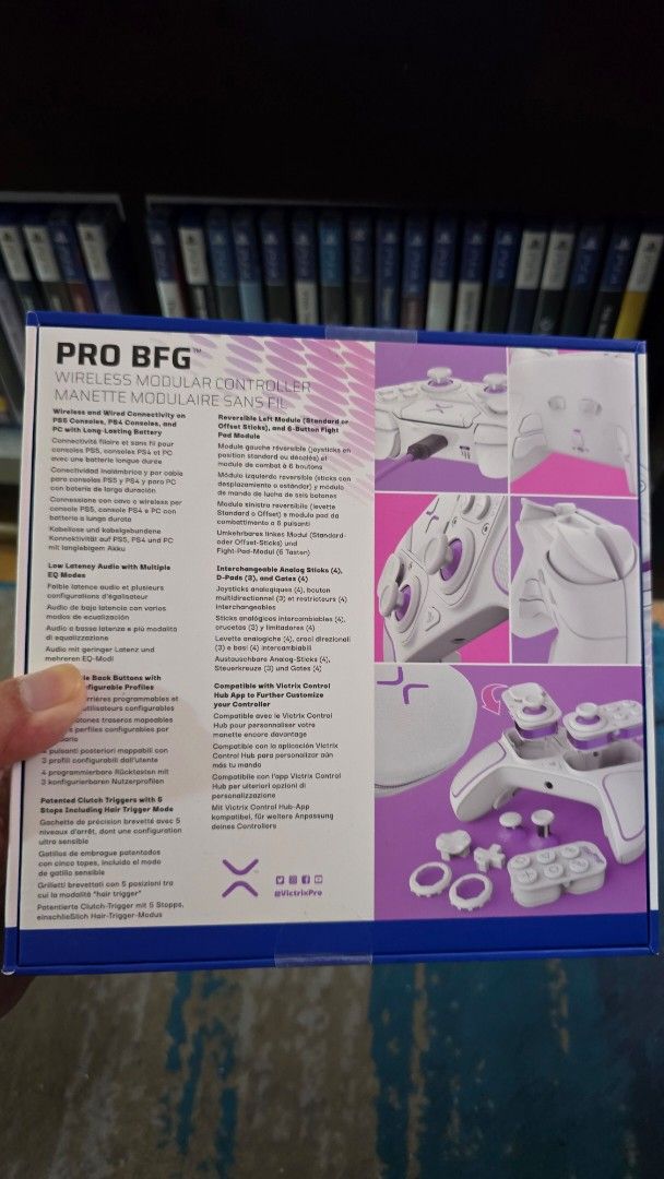 Victrix Pro BFG Wireless Modular Controller for PS5 (Category: Controllers) located in Pasig City. Submitted by jumpedmarrow979 (Listing ID 1411094646, Image 2). Description: Brand new and sealed Location: Pasig MoP: GCash, Maya, bank transfer - Wireless modular controller - Compatible with PlayStation 5 and PlayStation 4 - Stylish white and purple color scheme - Modular design for customization - Wireless connectivity.