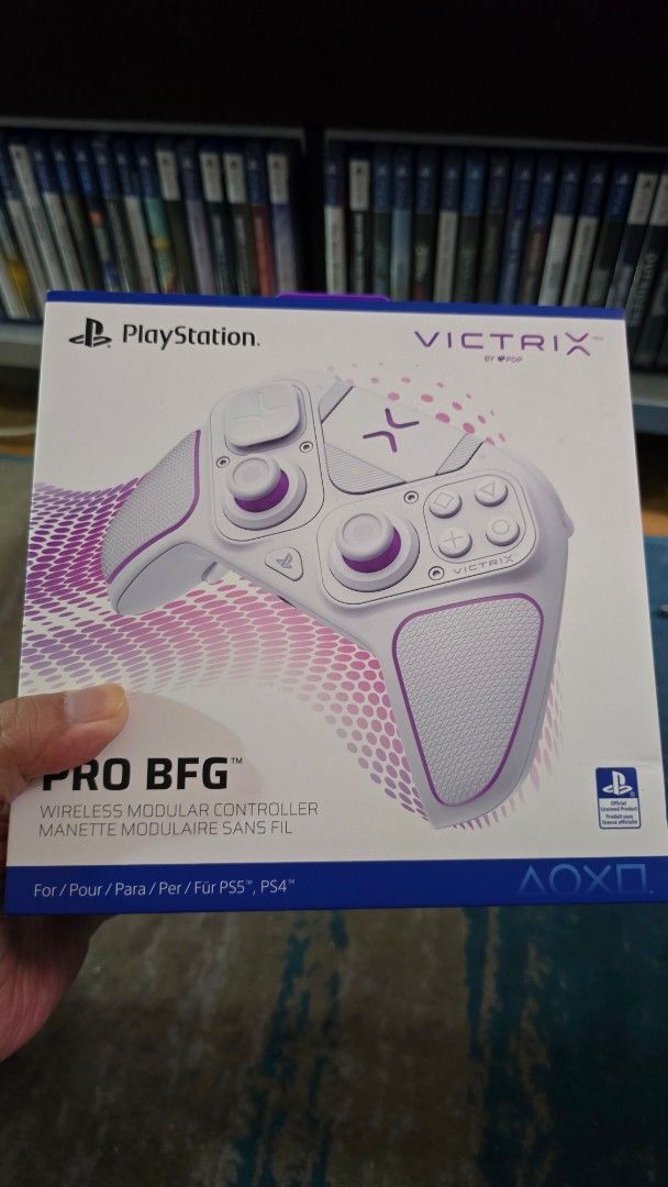 Victrix Pro BFG Wireless Modular Controller for PS5 (Category: Controllers) located in Pasig City. Submitted by jumpedmarrow979 (Listing ID 1411094646, Image 1). Description: Brand new and sealed Location: Pasig MoP: GCash, Maya, bank transfer - Wireless modular controller - Compatible with PlayStation 5 and PlayStation 4 - Stylish white and purple color scheme - Modular design for customization - Wireless connectivity.