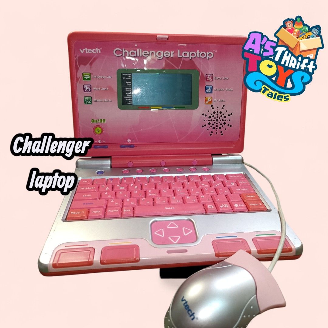 Vtech Challenger Laptop toy (Category: Laptops & Notebooks) located in Iligan City. Submitted by shehabdor98515 (Listing ID 1411264280, Image 1). Description: - VTech Challenger Laptop (Pink) - Includes a mouse - Features a keyboard and screen - Designed for educational purposes - Pink and silver color scheme - Fun design on top 👉meron po discolorations, slight faulty sa on and off but working naman for demo pm I will send video for sure buyer o