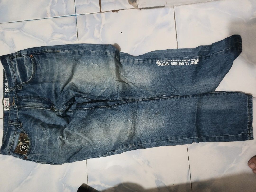 AAPE by A Bathing Ape Jeans (Category: Jeans) located in Imus. Submitted by boosterph691 (Listing ID 1401591497, Image 2). Description: auth aape regular pants dimes:32x41 issue: chip prints, burned patch, and scratches .