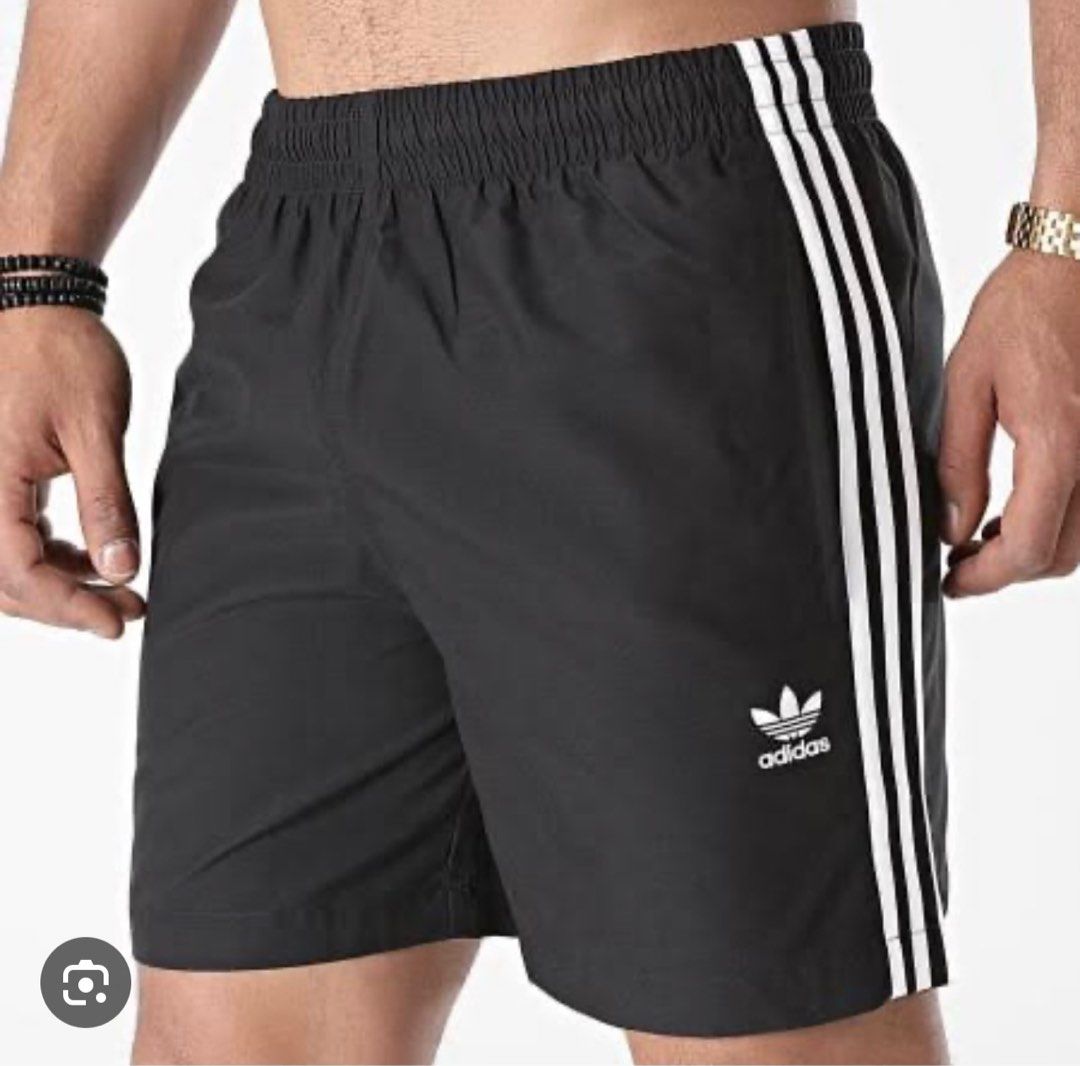 Adidas 3-Stripes Swim Short (Category: Shorts) located in Cebu City. Submitted by mark24anth29233 (Listing ID 1411409280, Image 1). Description: Size: Large On tag W30-33 L16 Leg Opening 12” Excellent condi No issue Need wash only.