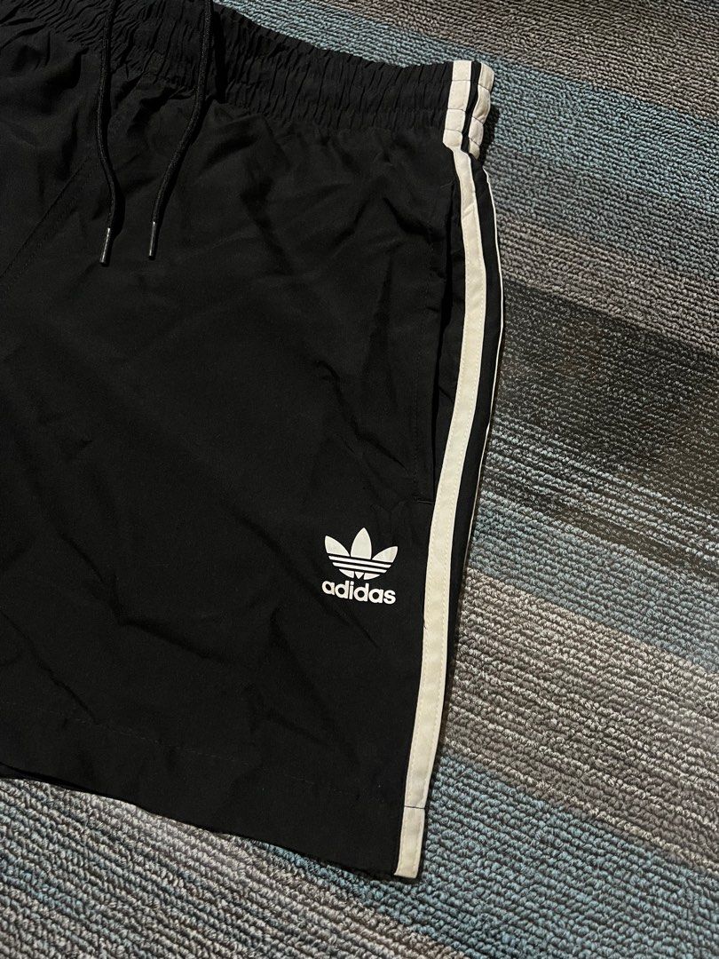 Adidas 3-Stripes Swim Short (Category: Shorts) located in Cebu City. Submitted by mark24anth29233 (Listing ID 1411409280, Image 3). Description: Size: Large On tag W30-33 L16 Leg Opening 12” Excellent condi No issue Need wash only.