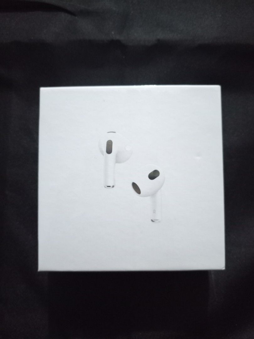 AirPods 3rd Gen with MagSafe Charging Case (Category: Earphones) located in Manila. Submitted by nhh_accessories (Listing ID 1411369199, Image 1). Description: - AirPods 3rd Generation with MagSafe Charging Case - Includes AirPods and charging case - Designed by Apple in California - Made in China - Box includes information in multiple languages.