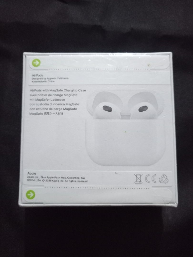 AirPods 3rd Gen with MagSafe Charging Case (Category: Earphones) located in Manila. Submitted by nhh_accessories (Listing ID 1411369199, Image 2). Description: - AirPods 3rd Generation with MagSafe Charging Case - Includes AirPods and charging case - Designed by Apple in California - Made in China - Box includes information in multiple languages.