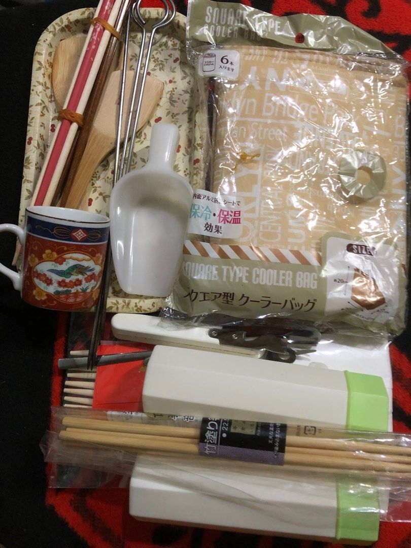 Assorted lot set of japan kitchenware related items (Category: Other Kitchenware & Tableware) located in Quezon City. Submitted by markgolveo (Listing ID 1411403674, Image 1). Description: Assorted lot set of japan kitchenware related items Assorted used and new items Set includes Bnew square type thermal cooling bag Multi tool bottle can cork opener Stainless steel coffee long stirrer and cake fork used Small floral tray Fancy small ceramic tea 