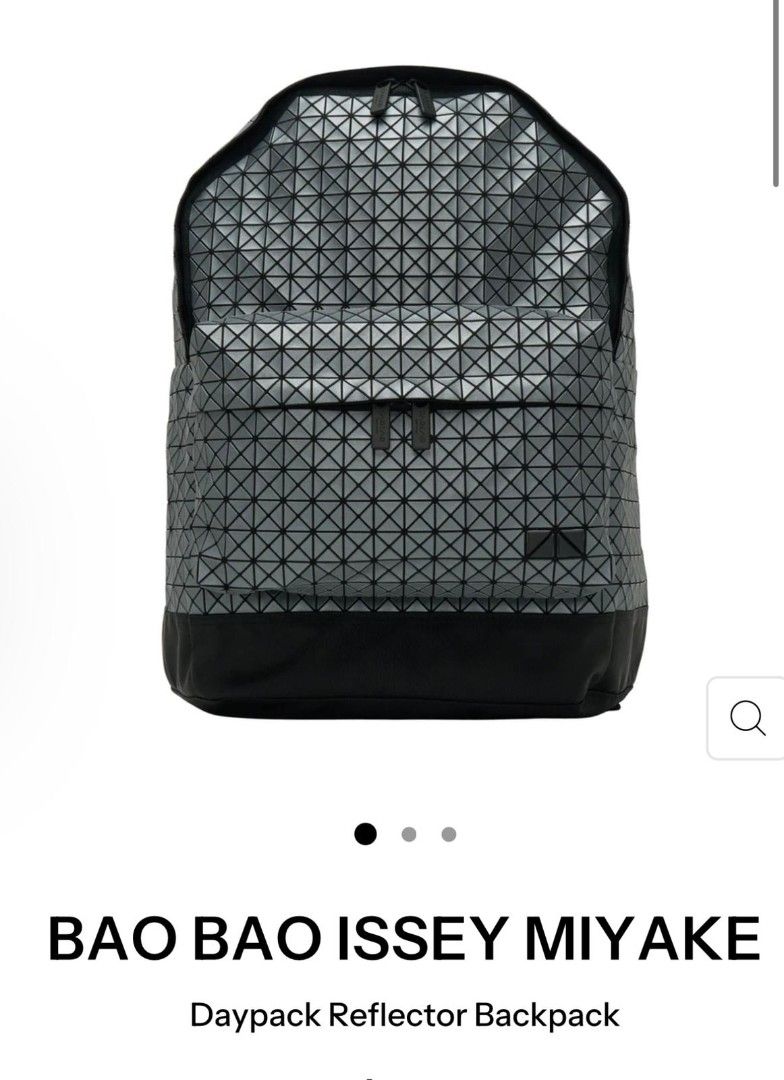 Backpack (Category: Backpacks) located in Singapore. Submitted by whyisskyblue (Listing ID 1411278010, Image 3). Description: Usual price is sgd935. Bag name: BAO BAO ISSEY MIYAKE Daypack Reflector Backpack Product details: PRODUCT DETAILS Signature triangular geometric panel construction Reflective metallic silver finish Main compartment with zip closure Front zip pocket Adjustable padded shoulder straps Black reinforced base and trim Structured