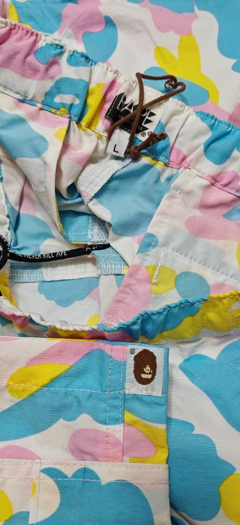 BAPE Camo Shorts - Size L (Category: Shorts) located in Makati City. Submitted by marquez25 (Listing ID 1411302658, Image 2). Description: - Authentic BAPE shorts - Size: Large - Colorful camo pattern - Drawstring waist - Two side pockets - BAPE logo tag - Made with quality materials - Ideal for casual wear.