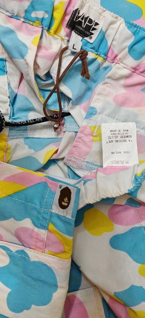 BAPE Camo Shorts - Size L (Category: Shorts) located in Makati City. Submitted by marquez25 (Listing ID 1411302658, Image 3). Description: - Authentic BAPE shorts - Size: Large - Colorful camo pattern - Drawstring waist - Two side pockets - BAPE logo tag - Made with quality materials - Ideal for casual wear.