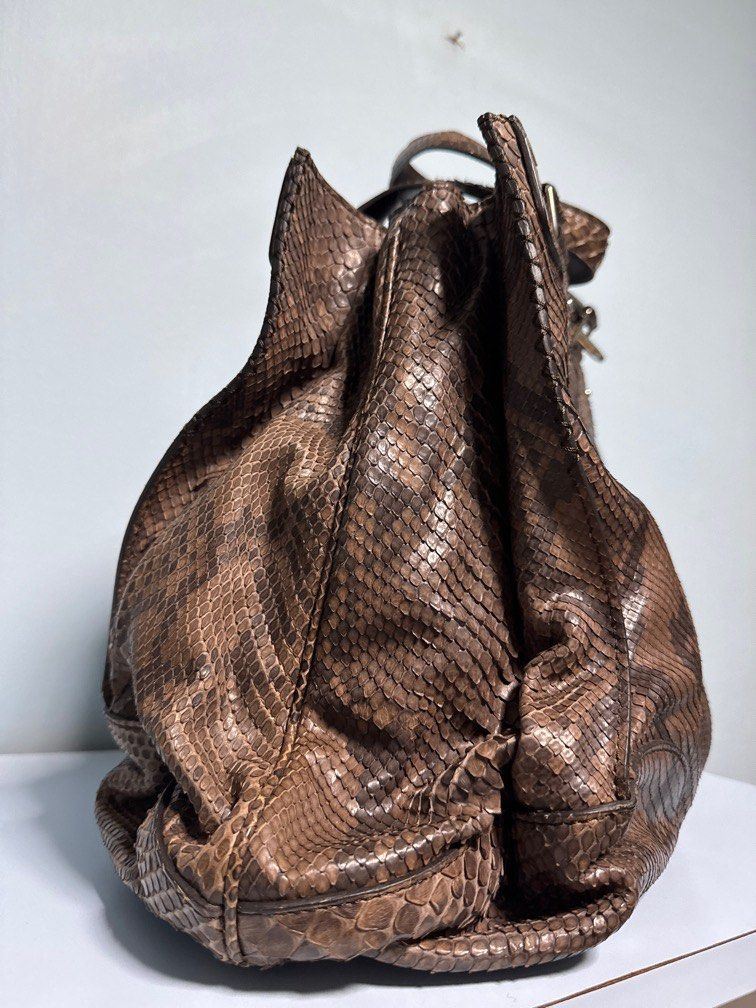 Celine Python Bag (Category: Bags & Wallets) located in Singapore. Submitted by 0naru (Listing ID 1411385455, Image 3). Description: Celine Python Charm Tote bag in brown python leather Used only a few times.