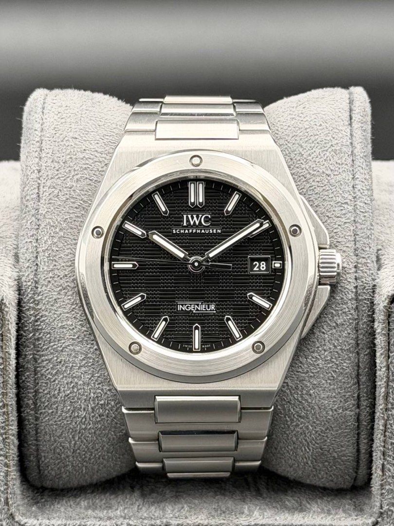 🔥CHEAPEST🔥 IWC Ingenieur Automatic 40 Black IW328901 2023 FULL SET Like New (Category: Watches) located in Singapore. Submitted by gdtimepieces (Listing ID 1411296589, Image 1). Description: Open to trades up/down! ** Shop Based ** Hi all, up for sales today is the IWC Ingenieur Automatic, ref. IW328901. A legendary piece with design roots tracing back to Gerald Genta. Featuring a 40mm stainless steel case, paired with a striking textured black