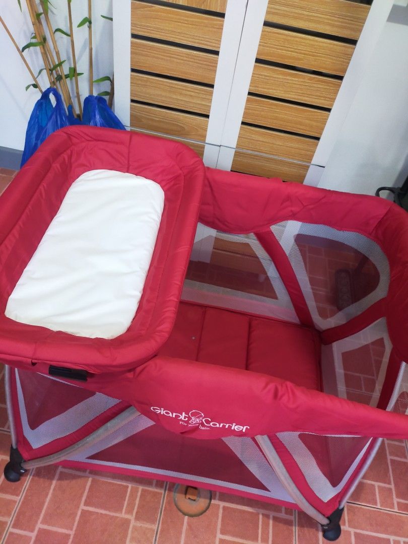Giant Carrier Playard with Bassinet (Category: Cots & Cribs) located in Quezon City. Submitted by rnabc (Listing ID 1411337405, Image 3). Description: The Baby Company Crib pls see last pic sa issue, may minimal lang na tastas. Bought at The Landmark, orig price 8k plus almost 9k. Loc QC.