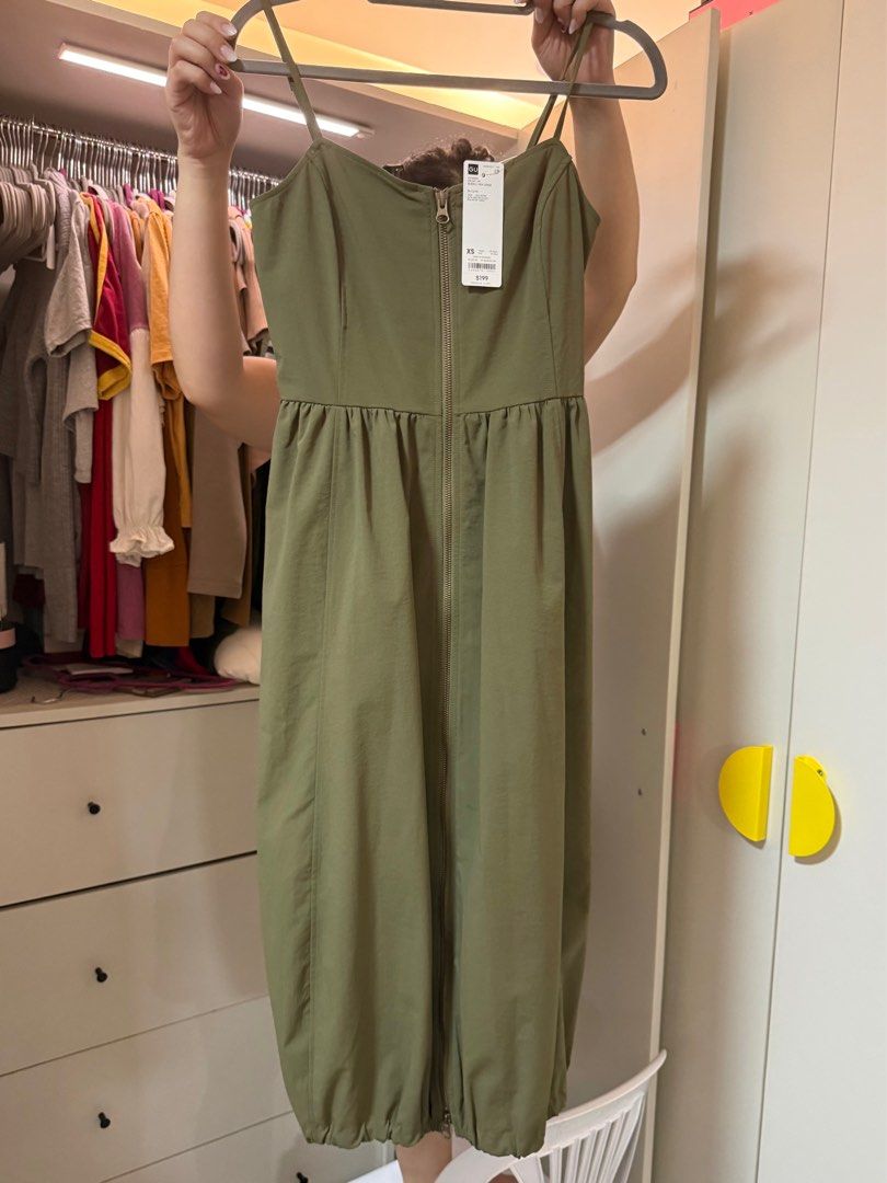 GU - Women Front Zip Bubble Hem Dress (Category: Dresses) located in Marikina City. Submitted by declutteringfatty (Listing ID 1411286879, Image 2). Description: GU Women's Dress Color: Olive Green Features: Front zip, bubble hem Material: 100% Polyester Size: XS Brand New (Original Price: $199).