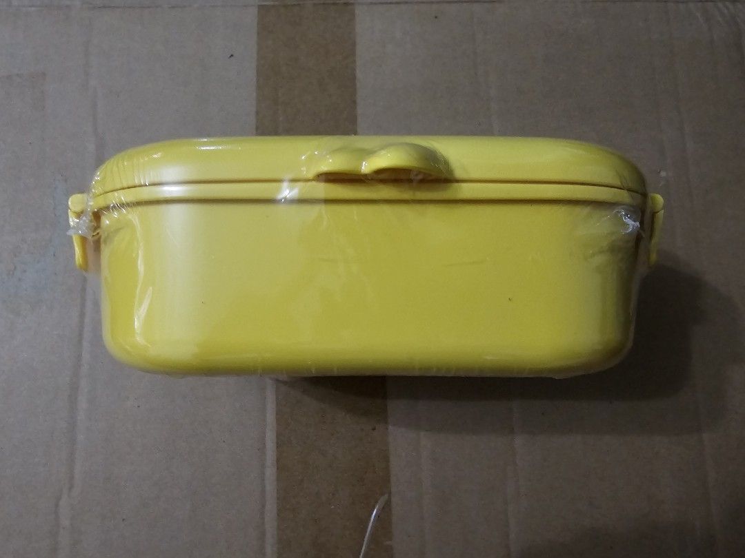Kawaii Duck Bento Box Lunch Box (Category: Food Organization & Storage) located in Manila. Submitted by havrehomes (Listing ID 1411370798, Image 2). Description: Adorable yellow lunch box features a duck design. It has a stainless steel interior with two compartments. The lid has a secure closure and a cute duck-shaped detail. It is perfect for packing lunches for kids or adults. The lunch box is compact and easy to carry..