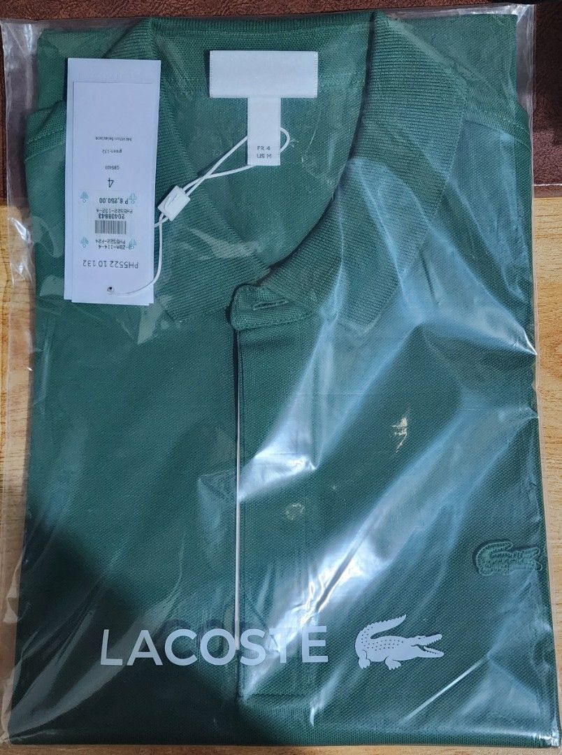 Lacoste Regular Fit Polo Shirt (Category: Tshirts & Polo Shirts ) located in Quezon City. Submitted by carpsmd (Listing ID 1411411294, Image 1). Description: Selling brandnew and original Lacoste shirts. All were bought locally. Selling because they are too big for me now willing to trade to smaller size (regular fit size 3 or asia slim fir size 4).