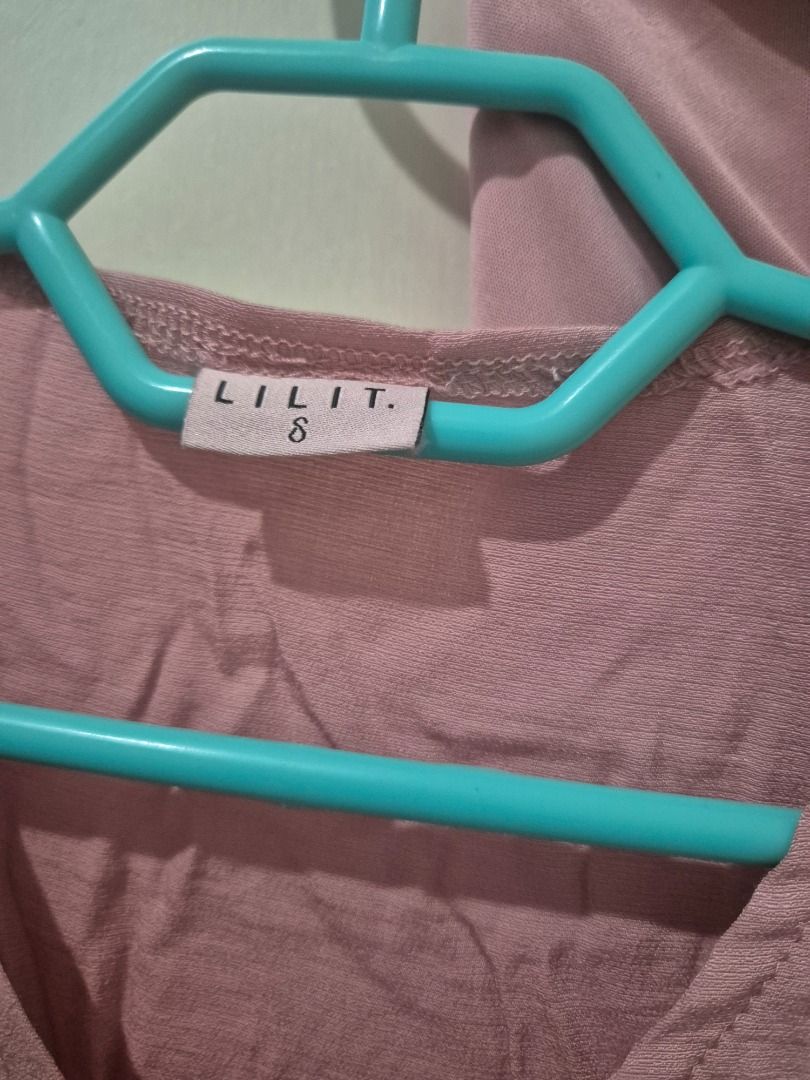Lilit maternity top and pants (Category: Sets or Coordinates) located in Kuala Lumpur. Submitted by normizs (Listing ID 1411281714, Image 2). Description: - Two-piece outfit in soft pink. - V-neck top with tie detail. - Long-sleeved top and matching pants. - Lightweight and comfortable fabric. - Perfect for casual wear..