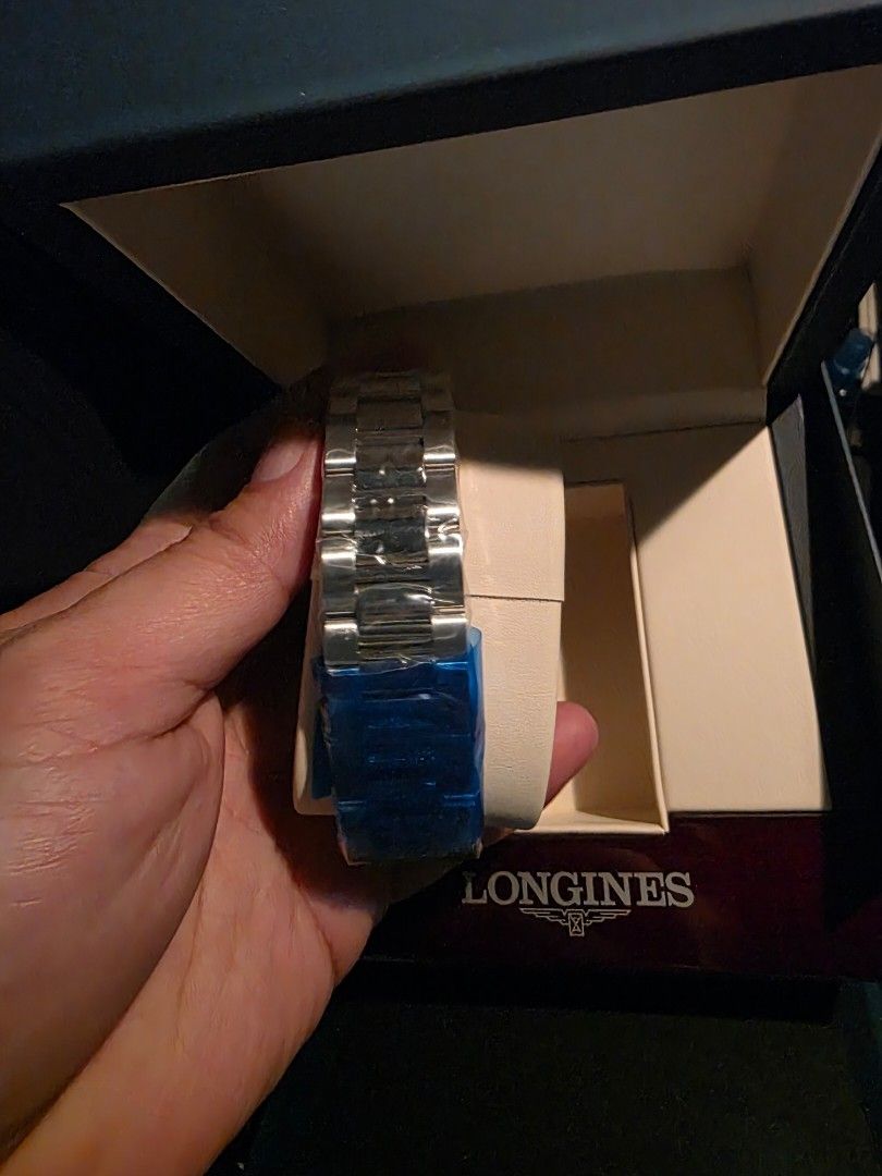 Longines Conquest Watch (Category: Luxury Watches) located in Manila. Submitted by iantrepreneuer (Listing ID 1411437393, Image 2). Description: - Longines Conquest watch -Quartz -41mm - Striking blue dial - Stainless steel bracelet - Includes original box and warranty card - Protective film on bracelet Foreign AD: Purchased December 2025 Selling below SRP, original price is 53,000php.