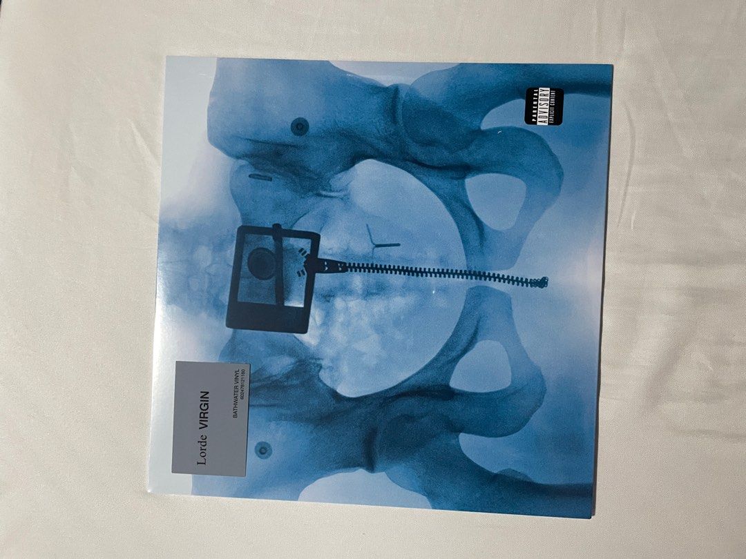 Lorde - Virgin Vinyl Record (Category: Vinyls) located in Manila. Submitted by goodboysrecords (Listing ID 1411367125, Image 1). Description: - Lorde "Virgin" vinyl record - Features album artwork with a blue-toned image - Includes a parental advisory sticker - In original packaging.