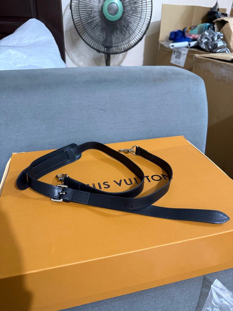 Louis Vuitton Black Leather Duffle Bag (Category: Luxury Bags & Wallets) located in Manila. Submitted by royal.prono (Listing ID 1411410985, Image 2). Description: - Louis Vuitton duffle bag - Black leather - Detachable shoulder strap included - Comes with luggage tag - Original box included - Silver-tone hardware - Includes original receipts and paperwork - Stylish and practical travel bag.