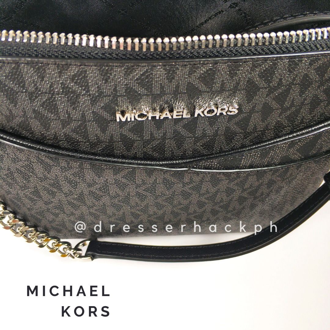 Michael Kors Dome Crossbody Bag (Category: Luxury Bags & Wallets) located in Marikina City. Submitted by dresserhackph (Listing ID 1411311137, Image 3). Description: CLOSING SALE 🥰 TAKE IT OR LEAVE IT ❤️ first to pay gets the item - Michael Kors crossbody bag - Dome shape with chain strap - Zip closure - Front pocket - Interior slip pocket - MK logo pattern - Silver-toned hardware - Blue and black color scheme.