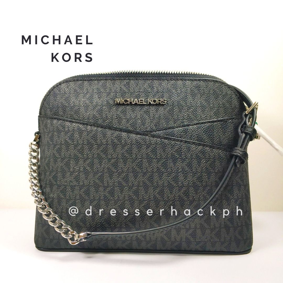 Michael Kors Dome Crossbody Bag (Category: Luxury Bags & Wallets) located in Marikina City. Submitted by dresserhackph (Listing ID 1411311137, Image 2). Description: CLOSING SALE 🥰 TAKE IT OR LEAVE IT ❤️ first to pay gets the item - Michael Kors crossbody bag - Dome shape with chain strap - Zip closure - Front pocket - Interior slip pocket - MK logo pattern - Silver-toned hardware - Blue and black color scheme.