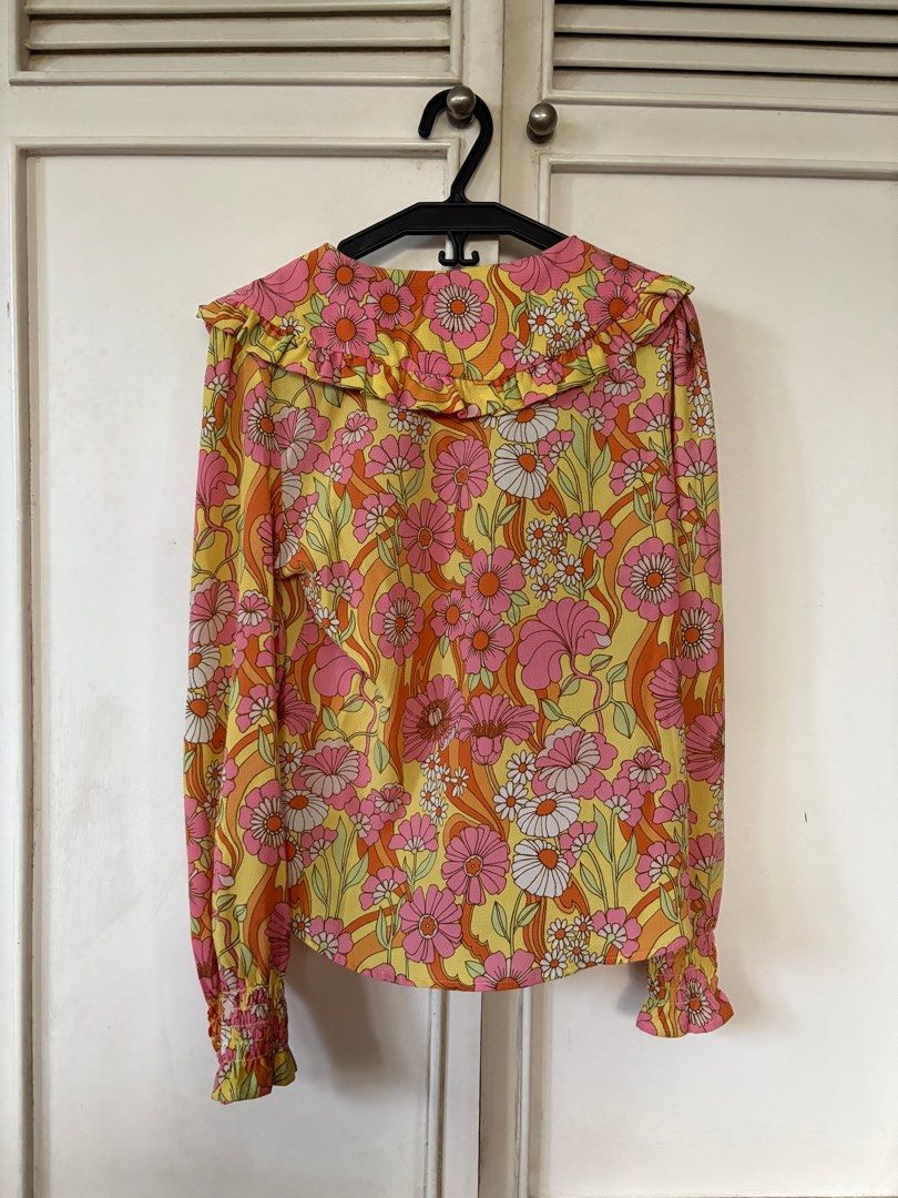 Monki Floral Blouse - Size M (Category: Blouses) located in Quezon City. Submitted by mcpar9685821 (Listing ID 1411319257, Image 2). Description: •worn only a few times, still in excellent condition •unique collar •retro and colorful design •sleeves end in elastic cuffs •very lightweight material; comfortable .