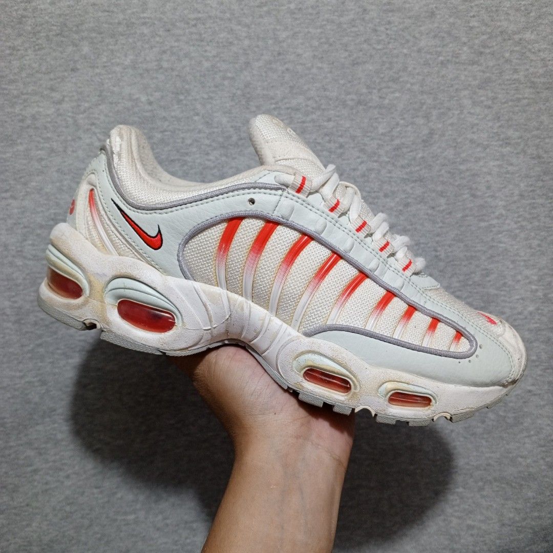 Nike Air Max Tailwind IV - White/Red (Category: Sneakers) located in Iligan City. Submitted by uishoe (Listing ID 1411439896, Image 1). Description: - Nike Air Max Tailwind IV - Color: White with red accents - Size: US 7, UK 6, EUR 40, 25 cm - Minimal Paint chip on midsole - Excellent Condition.