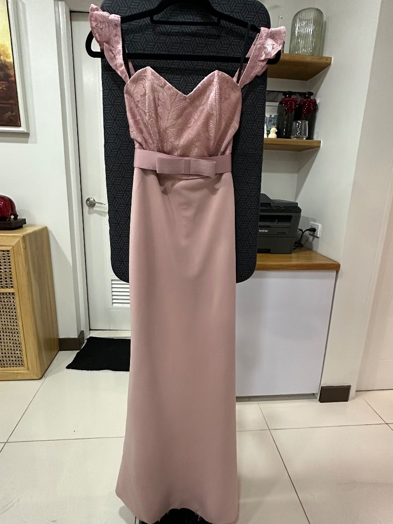 Pink Off-Shoulder Formal Dress (Category: Dresses) located in Pasig City. Submitted by angelssparecloset01 (Listing ID 1411311369, Image 1). Description: - Pink off-shoulder formal dress - Lace detailing on bodice - Fitted silhouette - Bow belt accentuates waist - Floor-length skirt - Ideal for formal events.