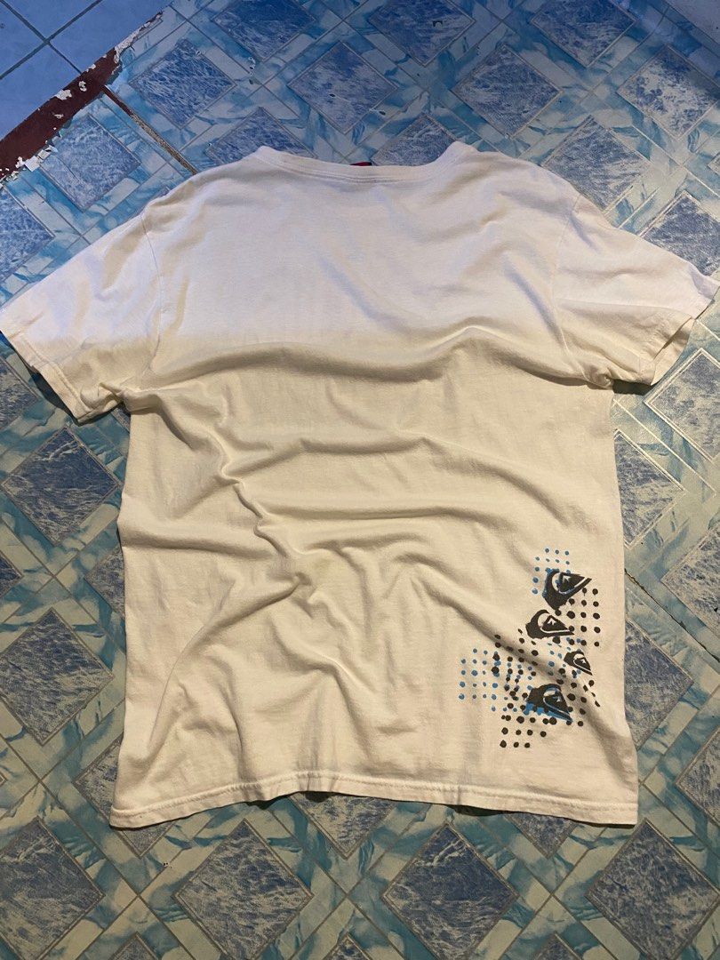 Quiksilver Graphic Tshirt (Category: Tshirts & Polo Shirts ) located in Navotas City. Submitted by patrickvarg (Listing ID 1411287612, Image 2). Description: M on tag 20x29 Issue: may mga black dot stain sa lower part and minimal yellow stain .