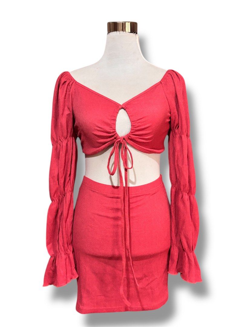 Red Crop Top and Mini Skirt Set (Category: Sets or Coordinates) located in Mati. Submitted by classicatch.ph_new (Listing ID 1411311132, Image 1). Description: BNEW Summer Terno 250 + SF Size: Small to Med - Red crop top with keyhole detail - Long, puffy sleeves - Matching mini skirt - Tie closure at the front - Ribbed fabric - Perfect for special occasions or a night out.