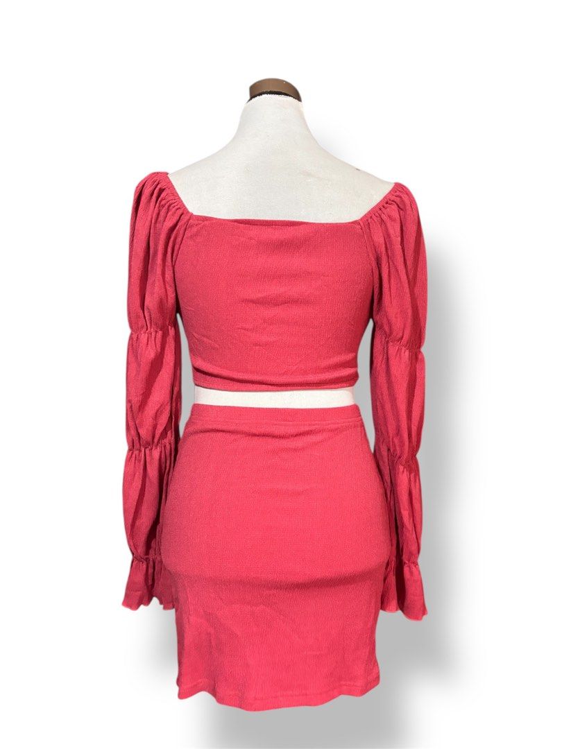 Red Crop Top and Mini Skirt Set (Category: Sets or Coordinates) located in Mati. Submitted by classicatch.ph_new (Listing ID 1411311132, Image 2). Description: BNEW Summer Terno 250 + SF Size: Small to Med - Red crop top with keyhole detail - Long, puffy sleeves - Matching mini skirt - Tie closure at the front - Ribbed fabric - Perfect for special occasions or a night out.