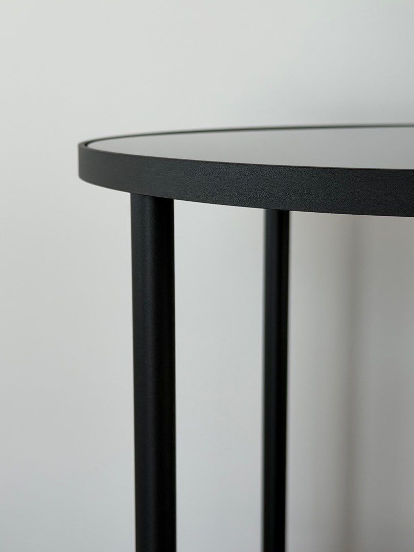 Side table classy (Category: Other Home Furniture) located in Singapore. Submitted by frau_h (Listing ID 1411428149, Image 2). Description: Black, black glass. Like new. No scratches Height: 60 cm Diameter: 45 cm Free height under furniture: 17 cm Max. load: 5 kg Max. load/shelf: 10 kg.