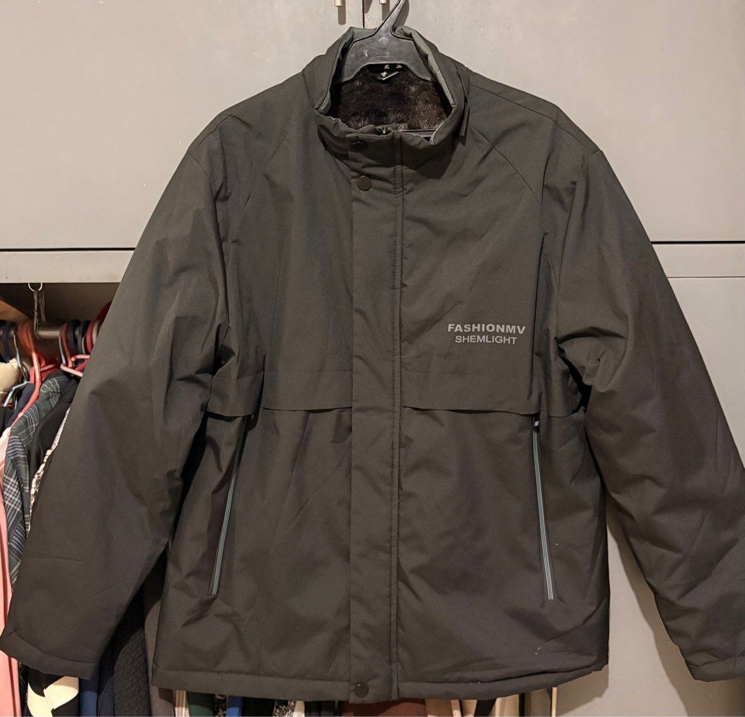 Unisex Black Winter Jacket with Fur Lining (Category: Coats, Jackets and Outerwear) located in San Juan City. Submitted by quickpenguin.0016e7 (Listing ID 1411346420, Image 1). Description: - Black winter jacket with a fur lining. - Features a zip-up front with snap closures, and multiple pockets. - Dimes: Chest / Bust 25 in Length 31 in .