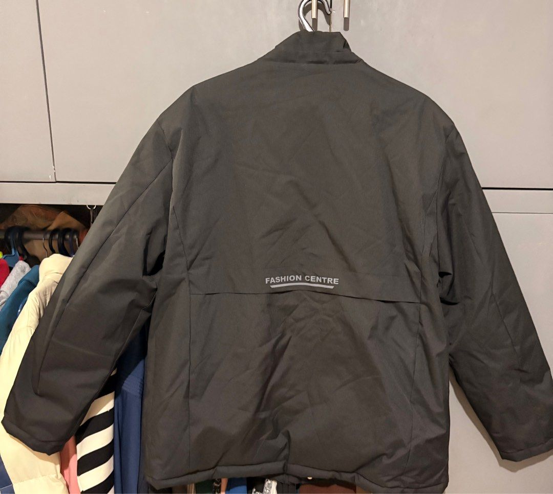 Unisex Black Winter Jacket with Fur Lining (Category: Coats, Jackets and Outerwear) located in San Juan City. Submitted by quickpenguin.0016e7 (Listing ID 1411346420, Image 2). Description: - Black winter jacket with a fur lining. - Features a zip-up front with snap closures, and multiple pockets. - Dimes: Chest / Bust 25 in Length 31 in .