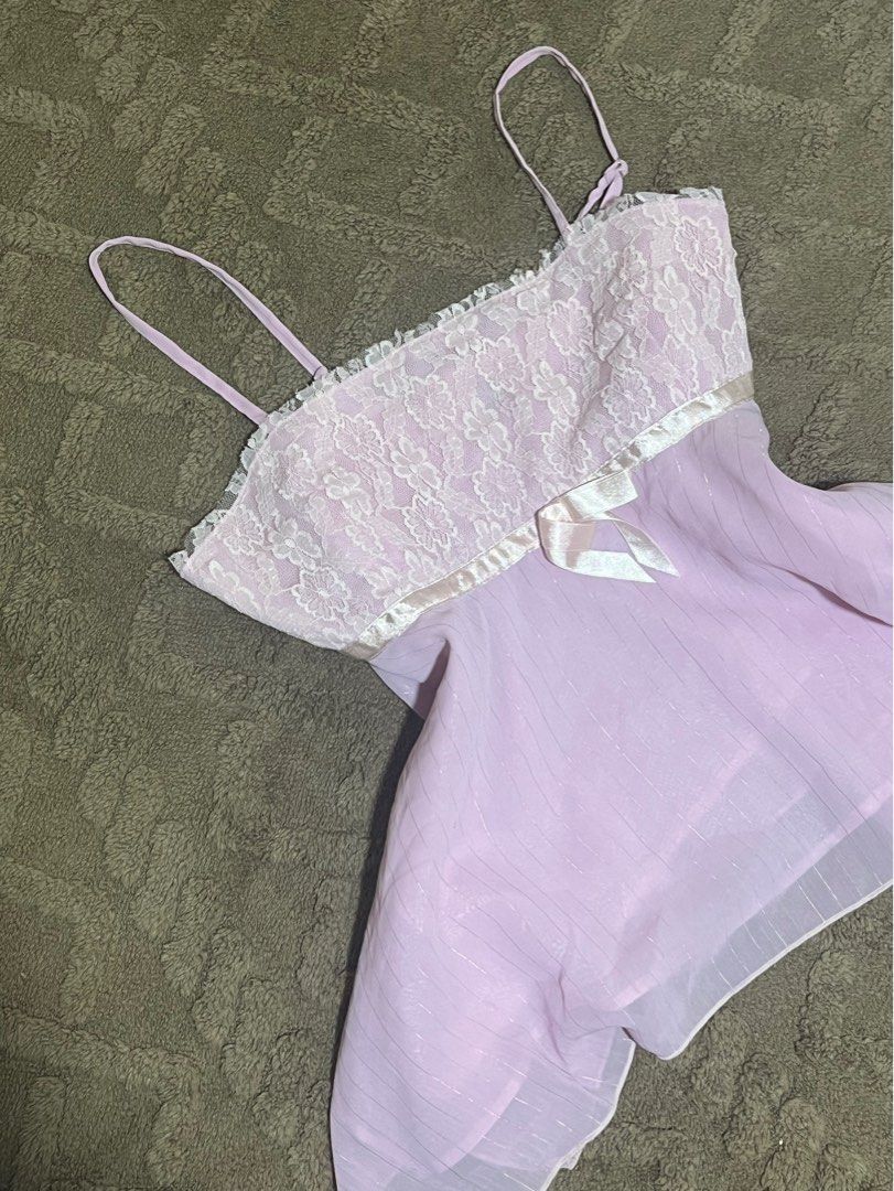 vintage pink lace bow top (Category: Others Tops) located in Tuguegarao City. Submitted by noellestyles (Listing ID 1411359987, Image 2). Description: FREE SF AROUND LUZON fits small - medium! very nice in actual perfect for coquette girlies 🎀 has zipper closure in the side can give discount for sure buyer!!! dm for when worn ⛲️🔆 🏷️ vintage coquette top pink top zara h&m cotton on vintage top lace top.